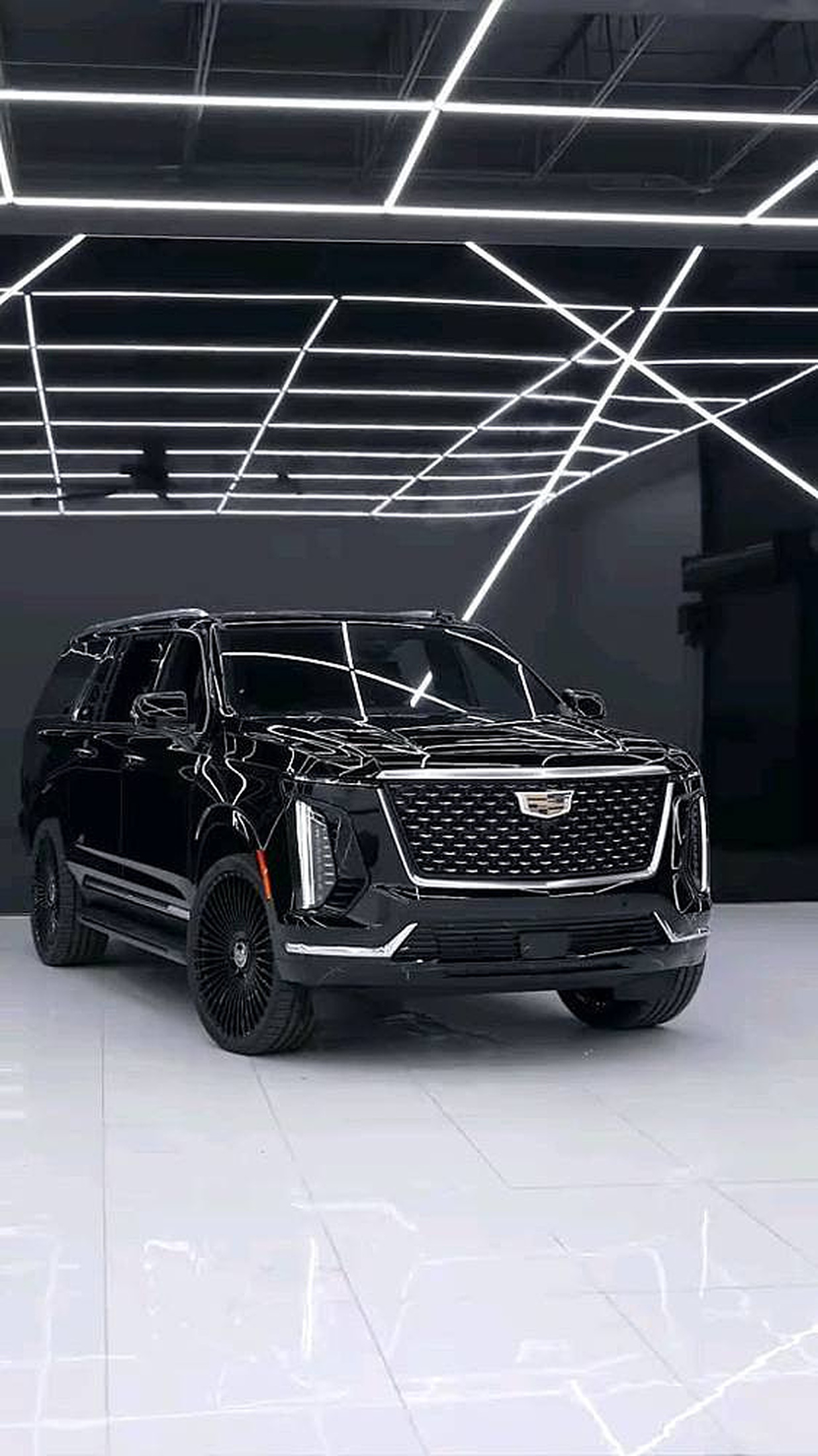 Cadillac Escalade in the Eagle Best Way Motors showroom